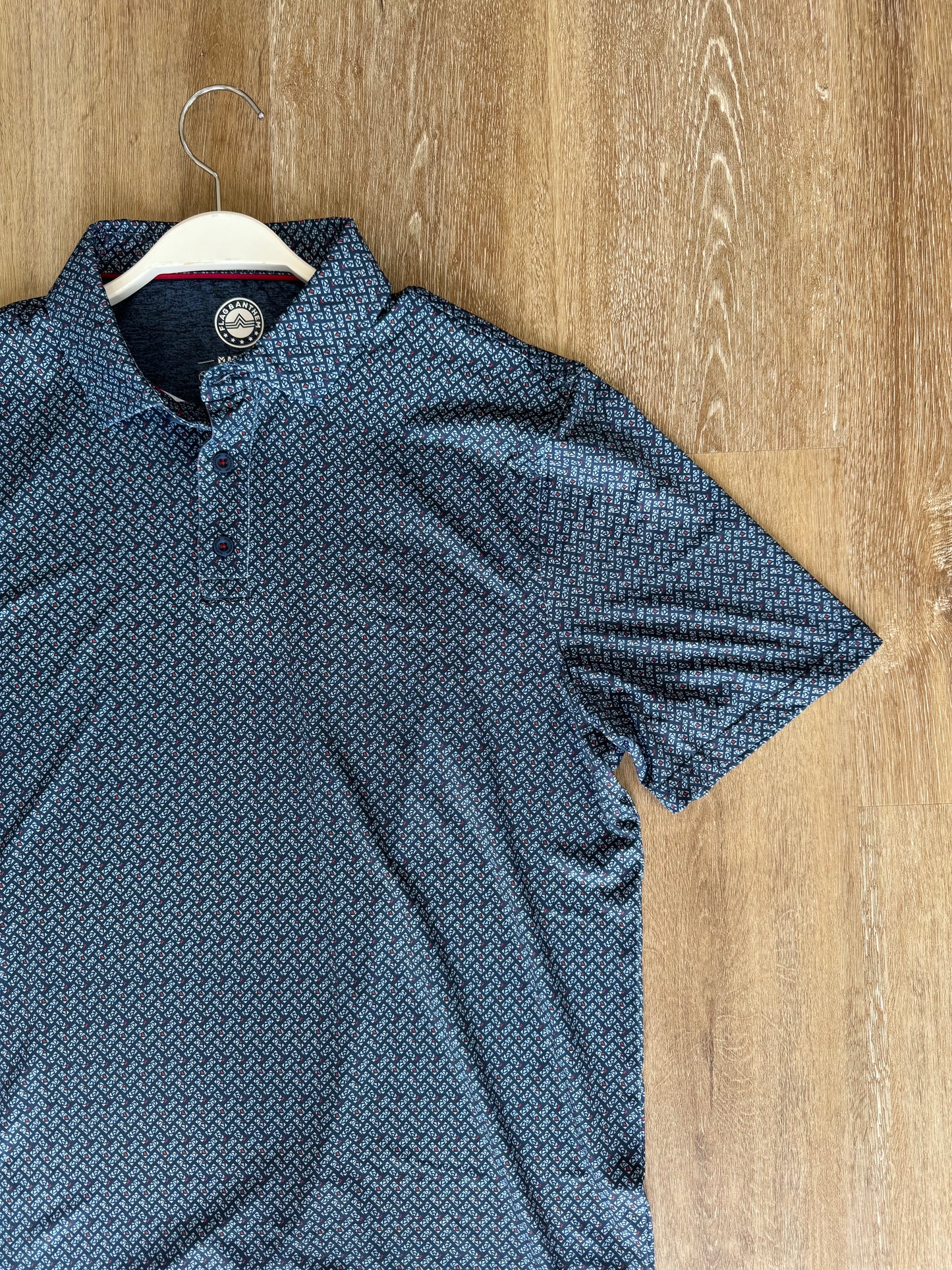 Oakton Triangle Geo Print Performance Polo - Navy